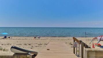 On the beach, sun loungers