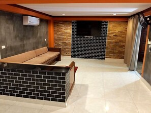 Family Room, City View | In-room safe, desk, laptop workspace, blackout drapes - Baan Ketkaew Patong (Patong)