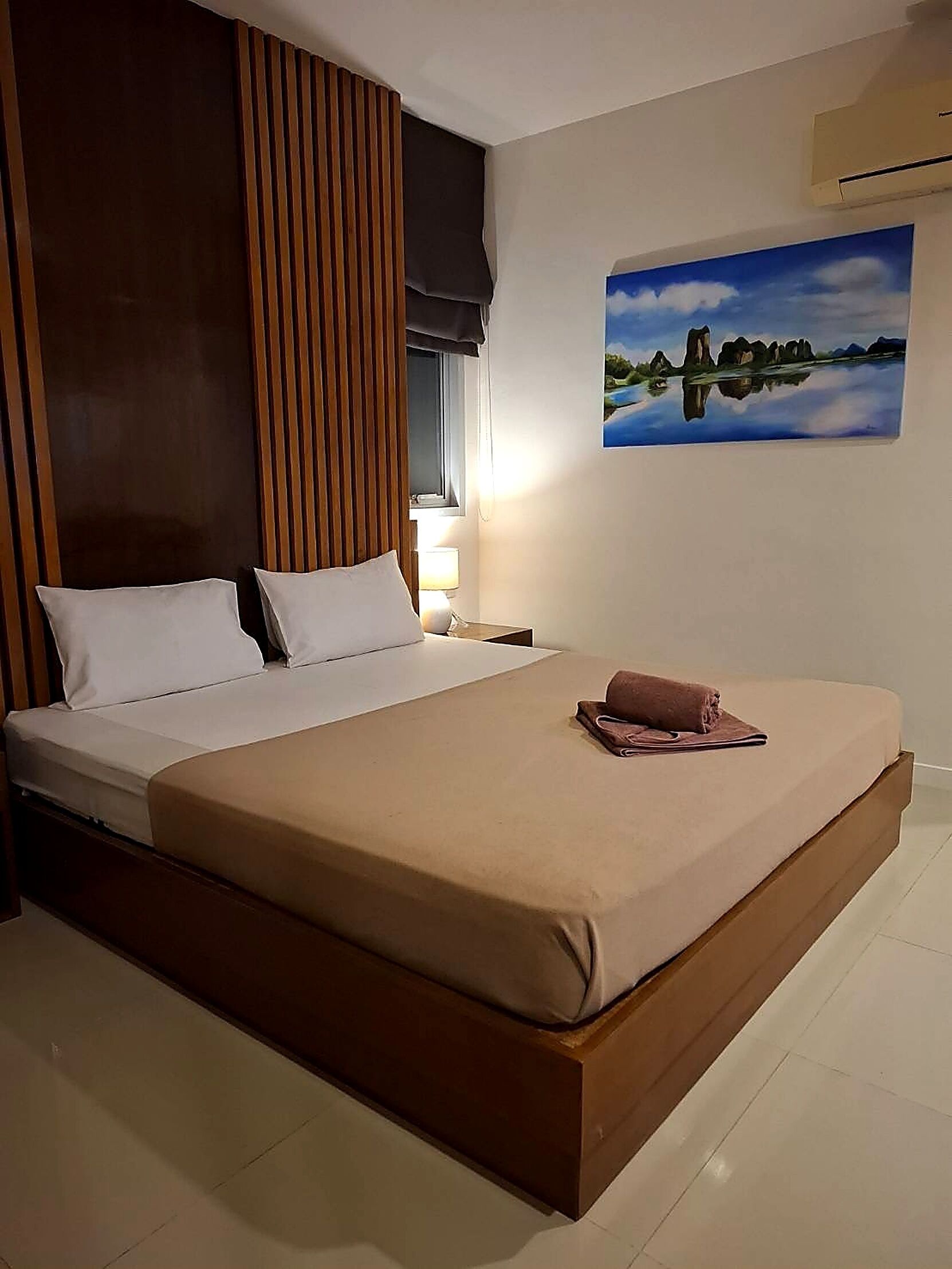 Deluxe Double Room, Balcony, City View | In-room safe, desk, laptop workspace, blackout drapes