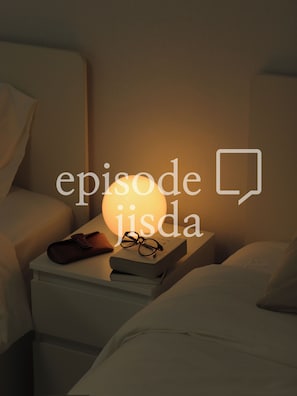 A bedside table with a book, glasses, and a pair of slippers. - Experience Seoul in a quiet area, just 4 minutes from Dapsimni Station. (Seoul)