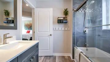 Shower, towels, soap, toilet paper