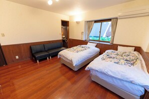 A room with two beds, a bench, a window with curtains, and an air conditioning unit. - TOMONOWA (Bandai)