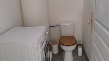 Shower, towels, soap, toilet paper