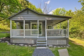 A small, single-story house with a porch, a front door, and a small front yard. - Robin`s Rest, Saylors Lake w/ Pond & Fire Pit (Saylorsburg)