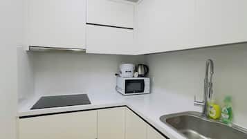 Fridge, microwave, stovetop, cookware/dishes/utensils
