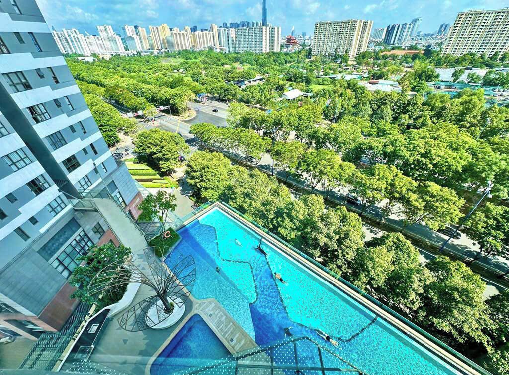 Outdoor pool, open 6:00 AM to 9:00 PM, pool loungers, lifeguards on site