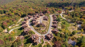 A residential area with houses arranged in a circular pattern around a central road. - Green Valley III at Eagles Nest (Banner Elk)