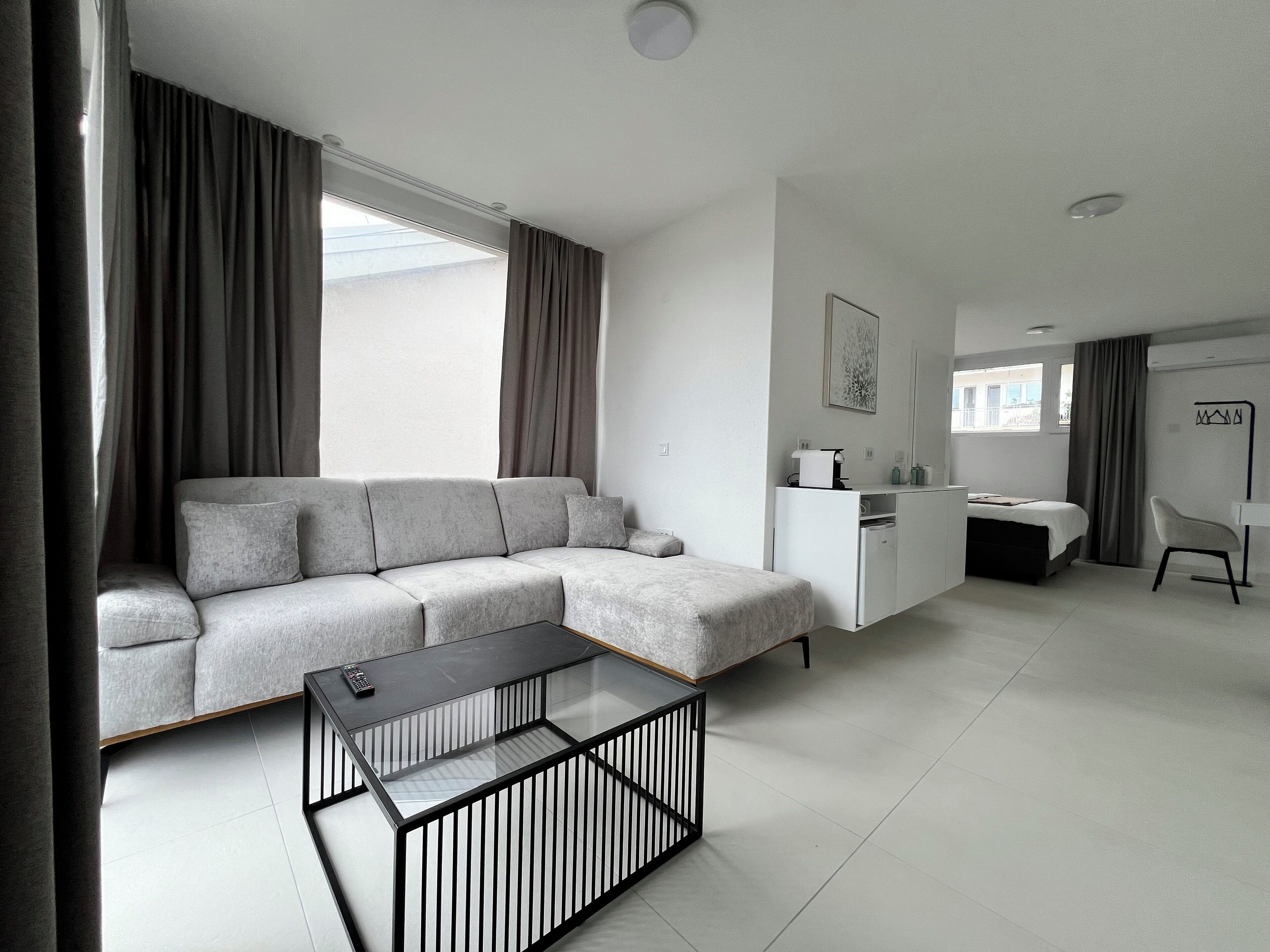 Comfort-Doppel- oder -Zweibettzimmer, Bergblick | Wohnbereich
