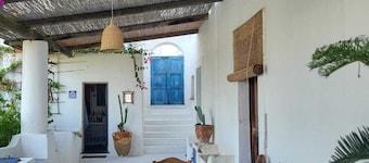 Ancient Aeolian house with large garden overlooking the sea and volcano