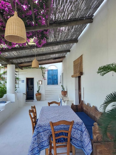 Ancient Aeolian house with large garden overlooking the sea and volcano