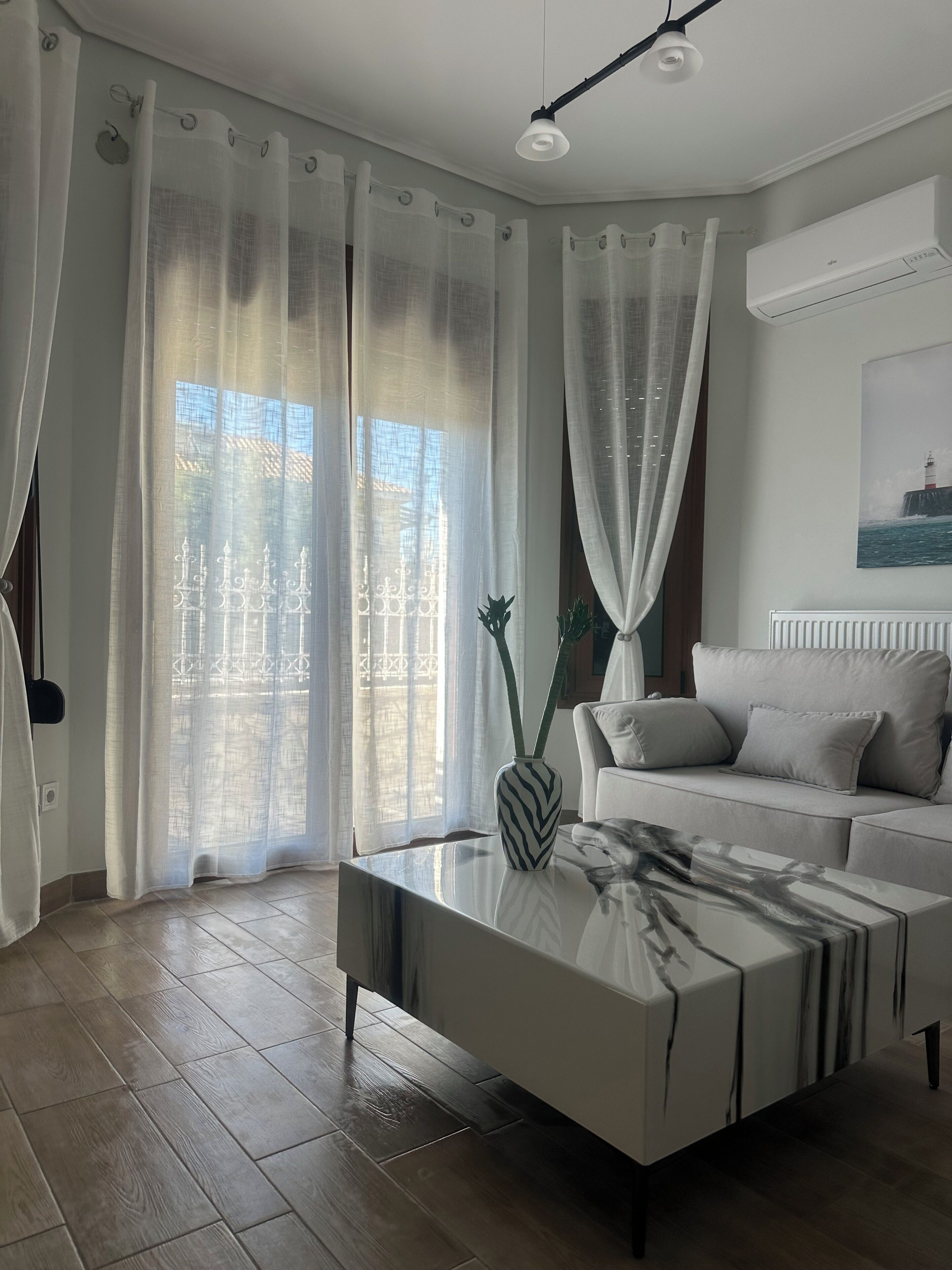 Deluxe Suite, Patio | Living area
