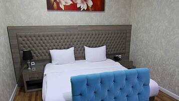 Deluxe Double Room, City View | In-room safe, desk, iron/ironing board, free WiFi
