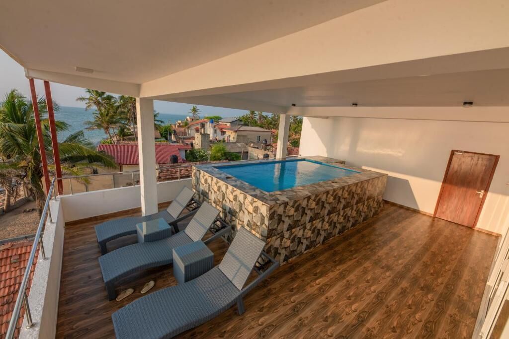 Habitación Deluxe doble, balcón, vistas al mar | Piscina