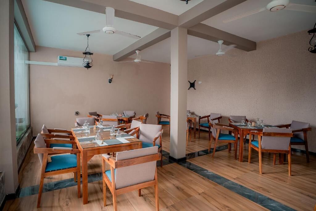 Habitación de lujo doble, balcón, vistas al mar | Restauración