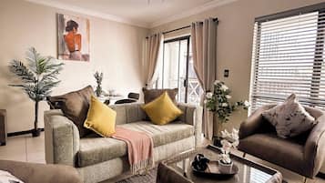 Apartamento, 1 quarto, acessível, varanda | Área de estar