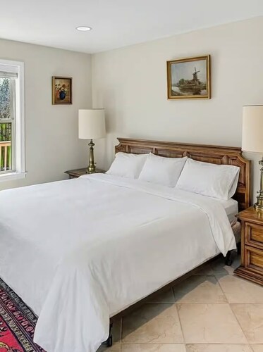 Enjoy this fully functional guest house with a beautiful backyard and forest!