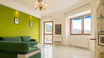 Suite, balkon, uitzicht op stad | Woonruimte