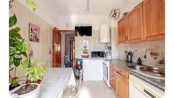 Luxury Room, City View | Private kitchen | Full-size fridge, microwave, oven, stovetop
