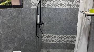 Shower, towels, soap, toilet paper