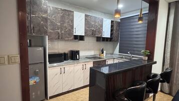 Fridge, microwave, stovetop, electric kettle
