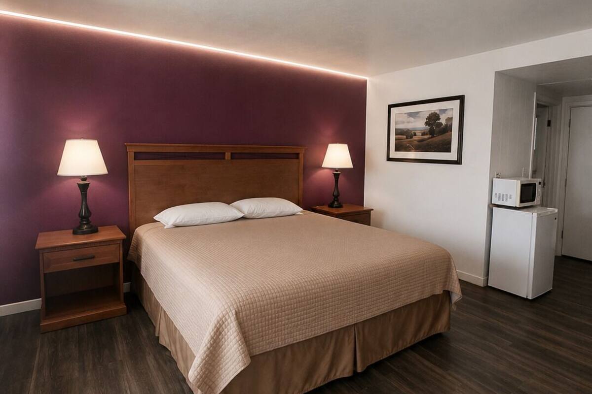 Desk, laptop workspace, blackout curtains, bed sheets