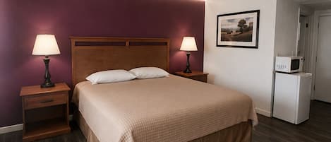 Deluxe Room, 1 King Bed, Non Smoking, Refrigerator | Desk, laptop workspace, blackout drapes, bed sheets