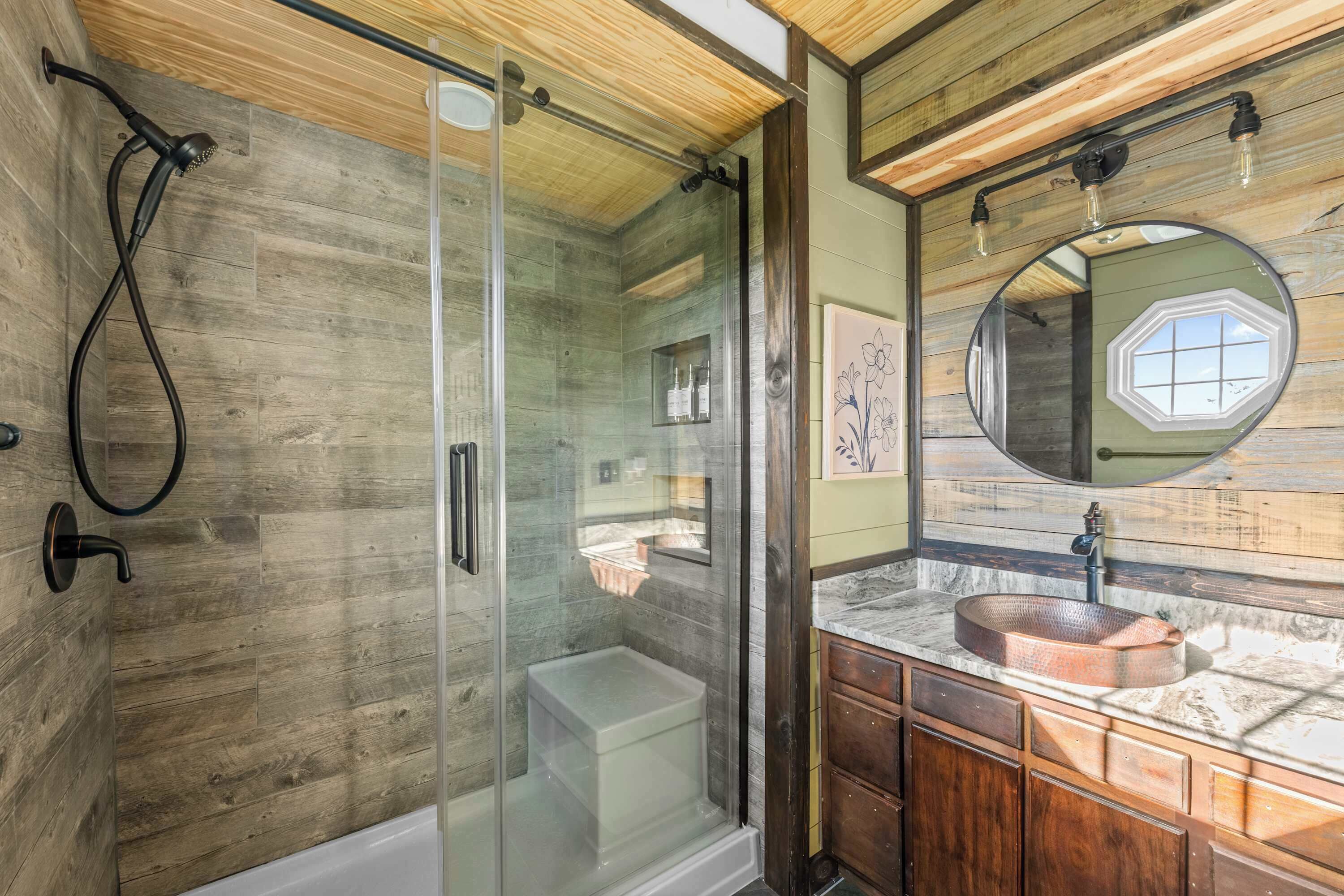 Shower, hair dryer, towels, shampoo