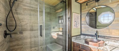 Shower, hair dryer, towels, shampoo