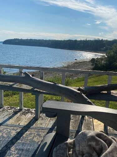 Serene 1-bedroom apartment on oceanfront property.