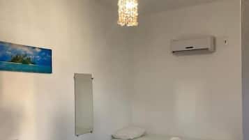 Habitación triple Confort, lanai, vistas al jardín | Wifi gratis