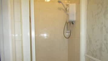 Ducha, artículos de tocador gratuitos, toallas, jabón