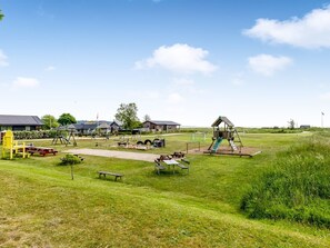 A playground with swings, slides, and picnic tables. - "Eufemia" - 250m from the sea by Interhome (Haderslev)