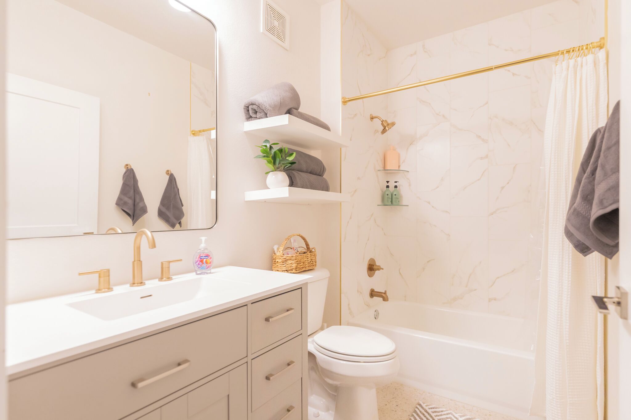 Hair dryer, towels, soap, toilet paper