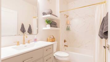 Hair dryer, towels, soap, toilet paper