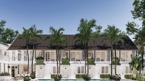 A two-story house with a large front lawn, a swimming pool, and multiple windows. - Nuho Living (Bingin, Uluwatu)