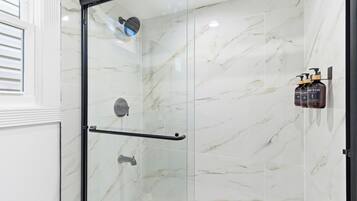 Shower, hair dryer, towels, soap