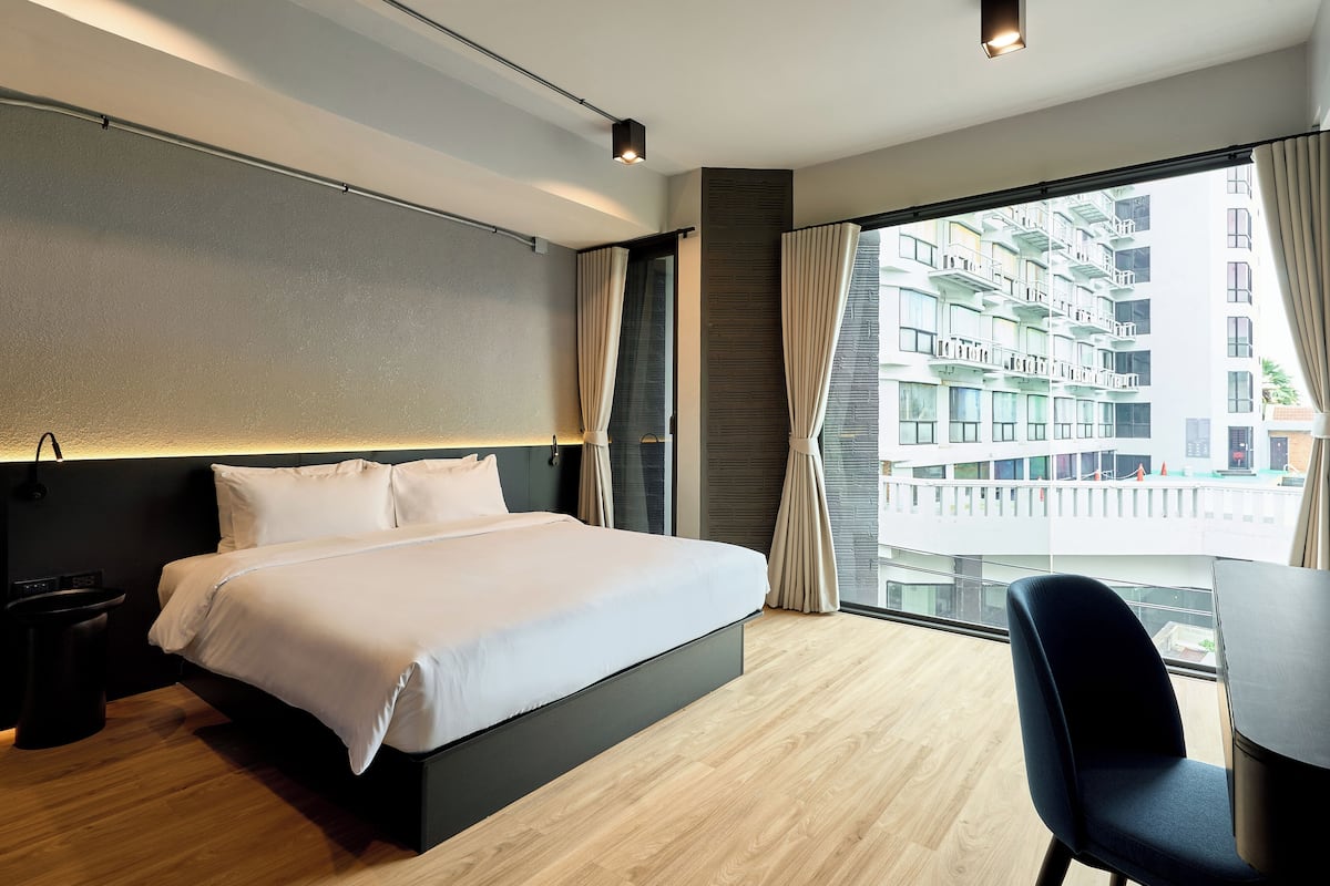 Deluxe-Doppelzimmer | Zimmersafe, Schreibtisch, laptopgeeigneter Arbeitsplatz, Reisekinderbett