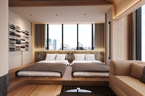 A hotel room with a city view, two beds, a sofa, and a wall-mounted shelf. - illi Sen Oshiage (Narihira, Sumida-ku)