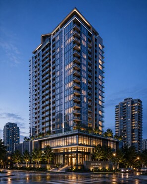A high-rise building with multiple balconies, a well-lit entrance, and a sign indicating it is a residence. - D'Pristine Medini by Johor Bahru (Iskandar Puteri)