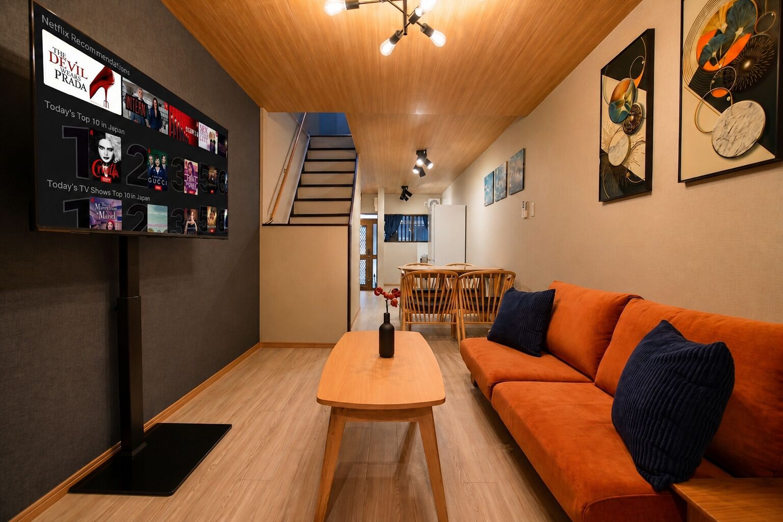 Comfort House | Living area | 50-inch flat-screen TV with cable channels