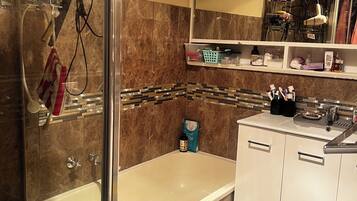 Hair dryer, towels, soap, toilet paper