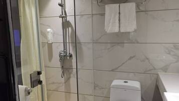 Basic Double Room Single Use, Park View | Bathroom | Shower, free toiletries, hair dryer, slippers
