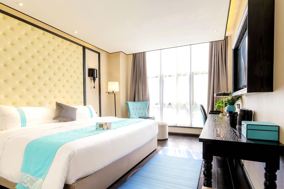 Suite de lujo, vistas a la ciudad | Ropa de cama de alta calidad y colchones con acolchado adicional