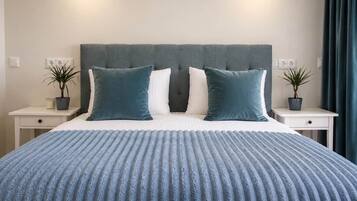 2 habitaciones, tabla de planchar con plancha, wifi y ropa de cama