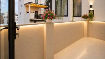 Habitación doble Deluxe, balcón, vista a la ciudad | Interior