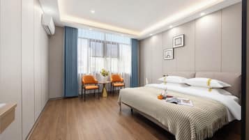 Executive Double Room | Desk, blackout drapes, iron/ironing board, free WiFi
