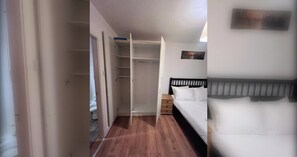 Quarto com cama, mesa de cabeceira, guarda-roupa e um quadro na parede.