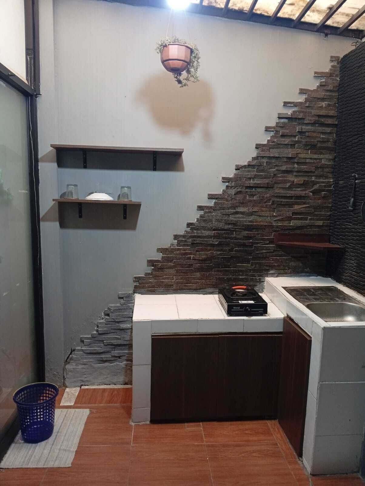 Deluxe Room | Private kitchen | Fridge