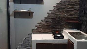 Deluxe Room | Private kitchen | Fridge