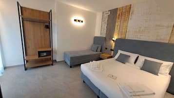 Suíte júnior | Roupas de cama premium, edredons de pluma, cofres nos quartos
